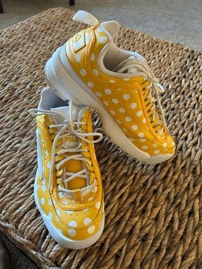 Fila Yellow and White Polka Dot Sneakers. Rugged sole.